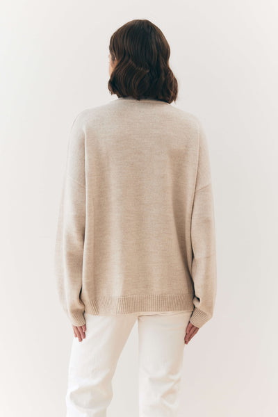 Wełniany sweter z okrągłym dekoltem beżowy