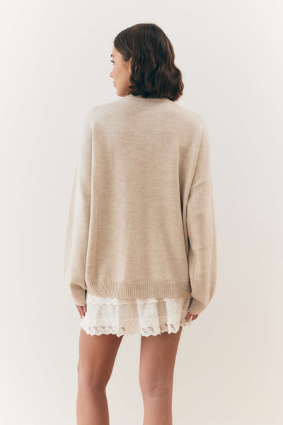Wełniany sweter z okrągłym dekoltem beżowy